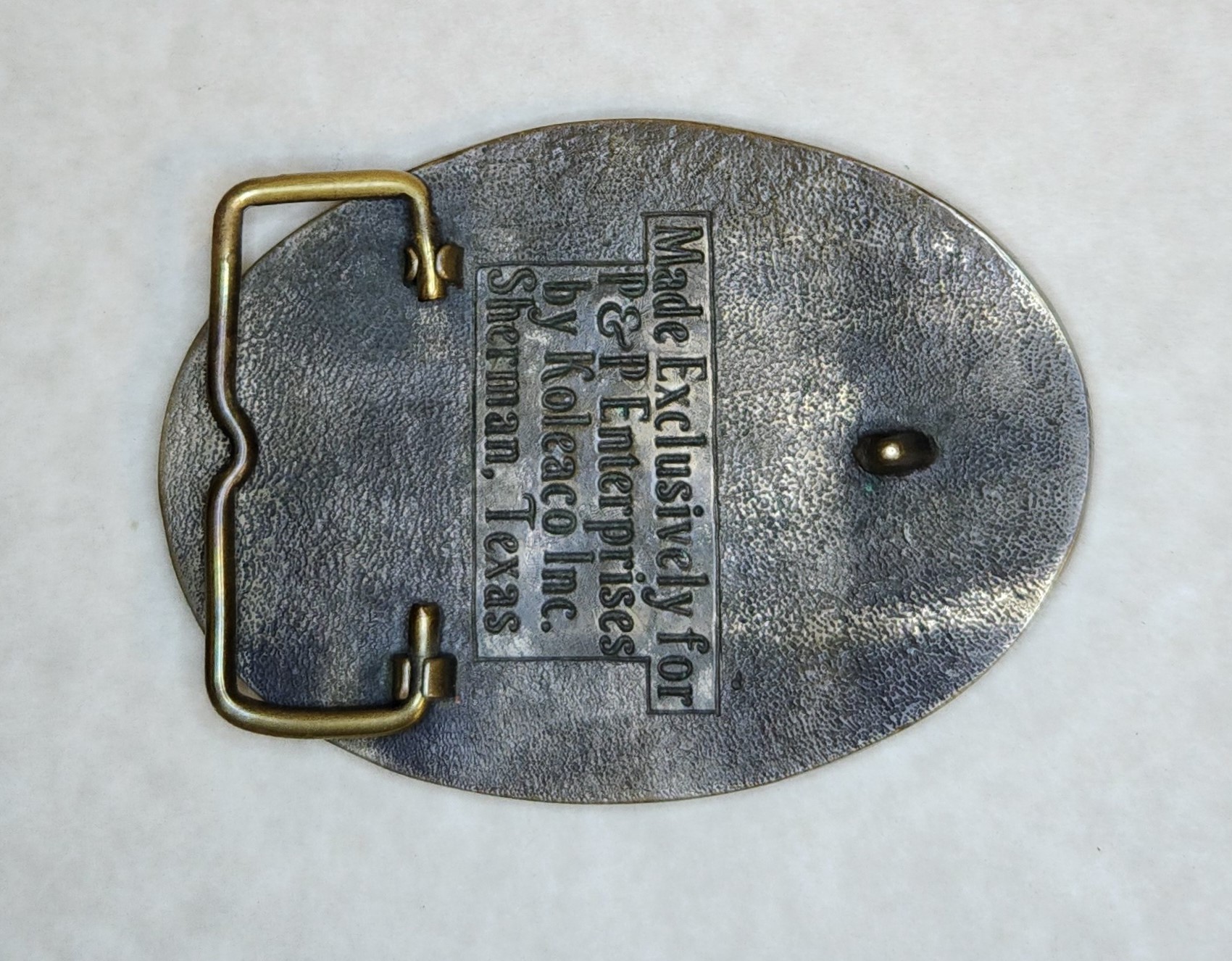 [Buckle Pic Missing] (Click here)